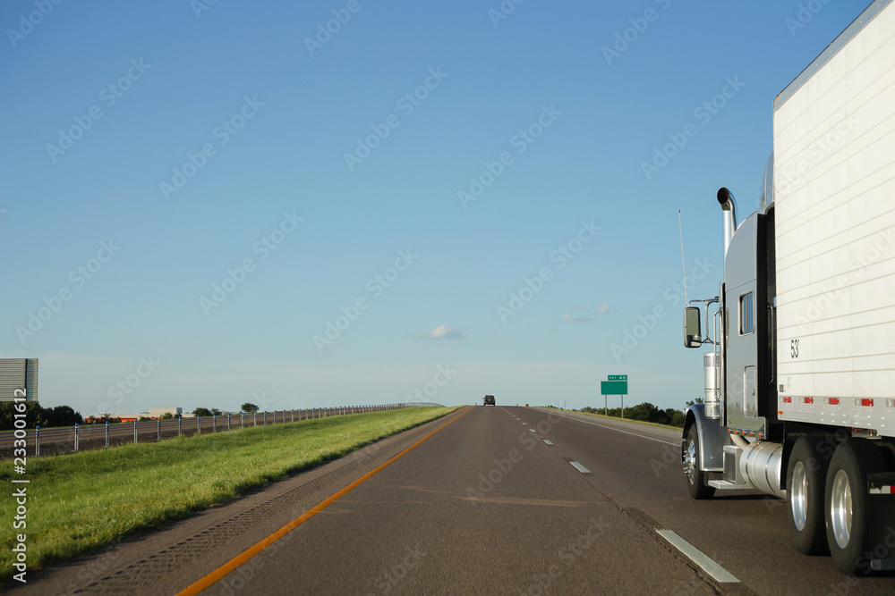 Roadway with driving transport in countryside Roadway with driving transport in countryside