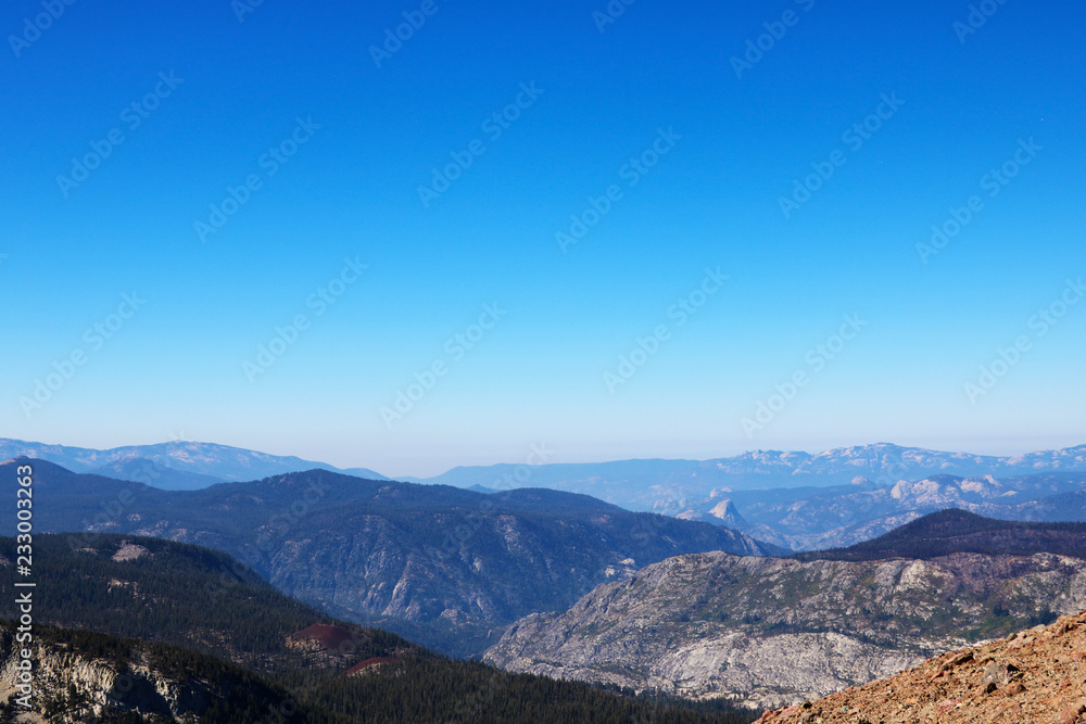 View of the mountain tops against the blue sky