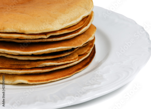 stack of fresh pancakes on white
