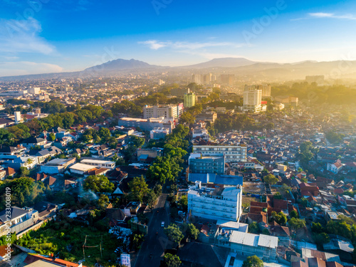 Aerial View of Bandung Cityscape, with Mount Tangkuban Parahu in the Background photo