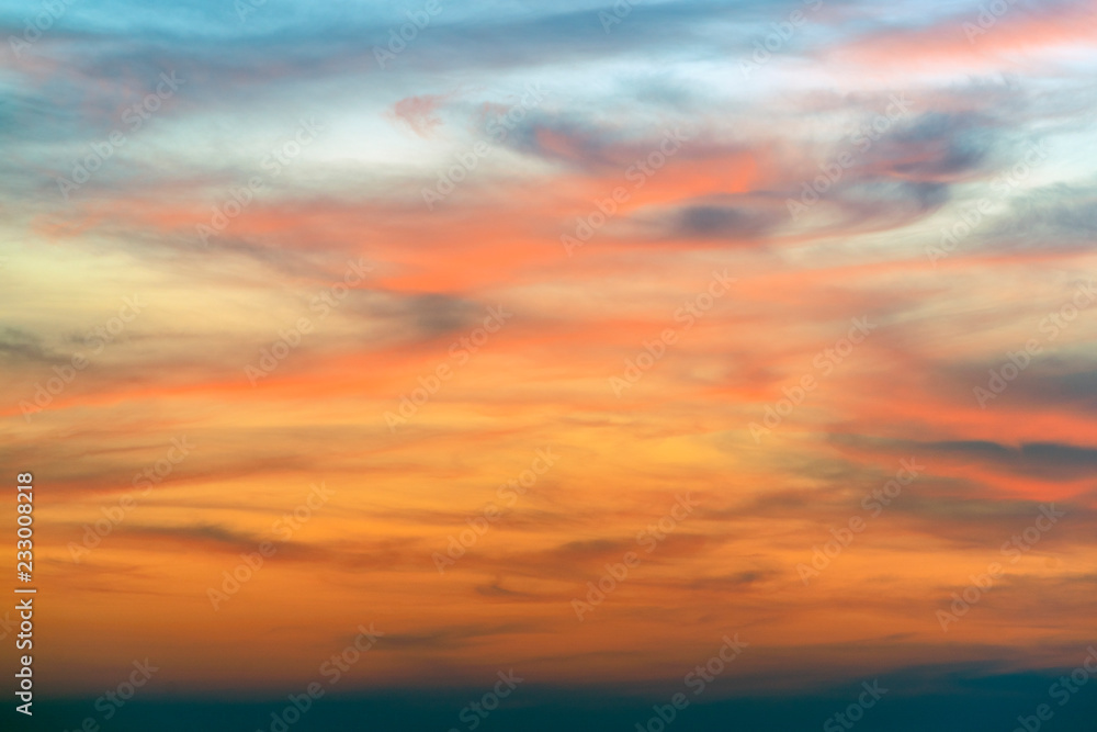 Fiery orange sunset sky. Beautiful sky. Beautiful orange clouds on