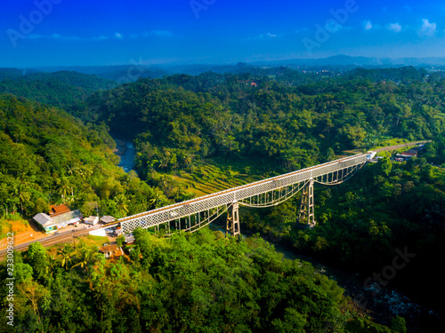 Scenic Aerial View of Cirahong Bridge, A Double Deck Structure of Metal Railway Bridge and Car Bridge Underneath Made by Dutch Colonial, Manonjaya Tasikmalaya, West Java Indonesia, Asia