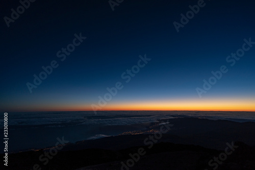 Sun is rising over Canary Islands, seen  from near the summit of Teide Mountain, Tenerife, Canary Islands, Spain