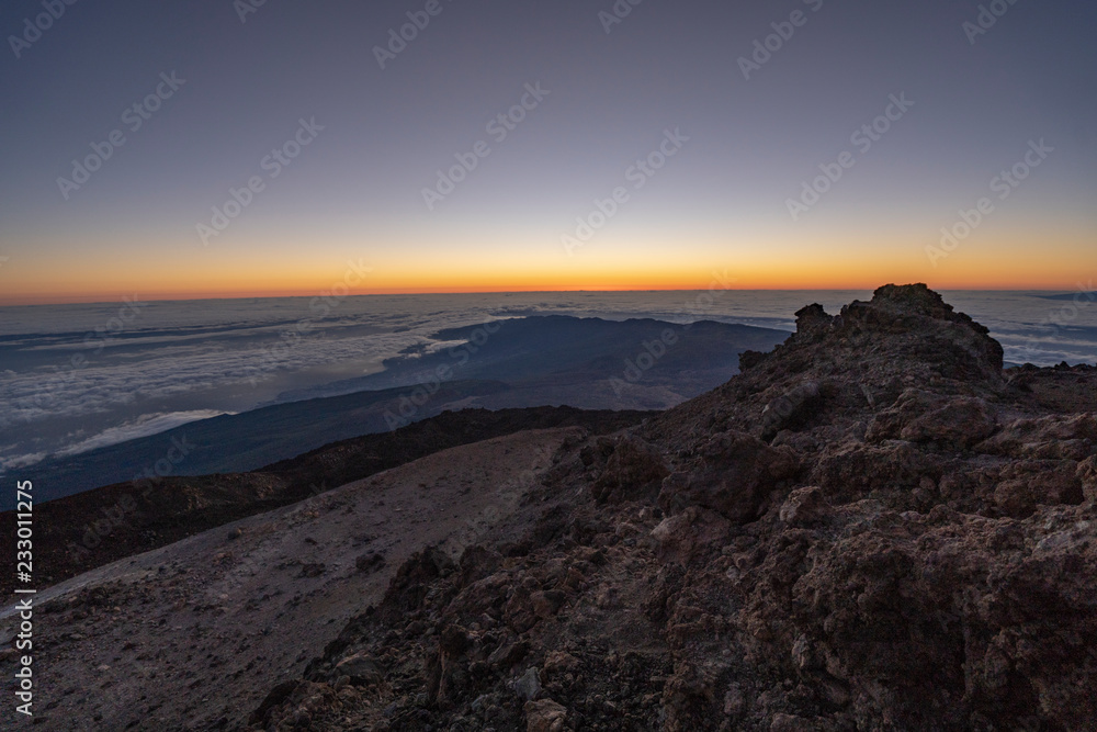 Sun is rising over Canary Islands, seen  from near the summit of Teide Mountain, Tenerife, Canary Islands, Spain