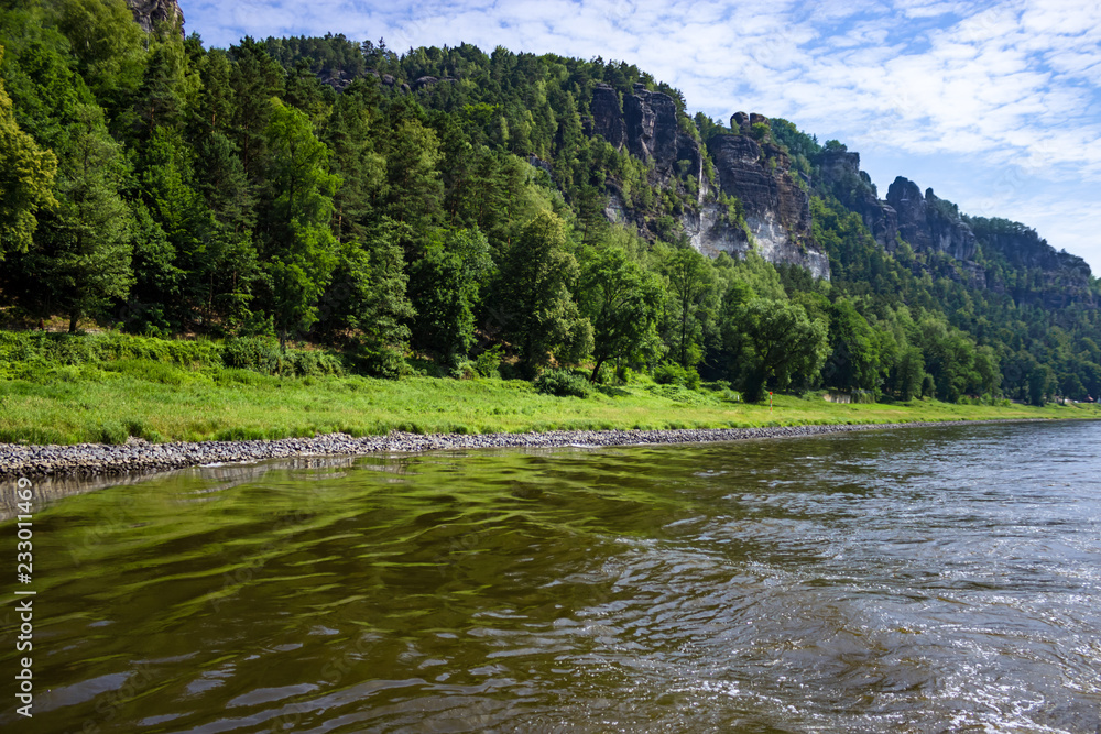Beautiful view on sandstone mountains from river Elbe in Saxony, Germany Beautiful view on sandstone mountains from river Elbe in Saxony, Germany