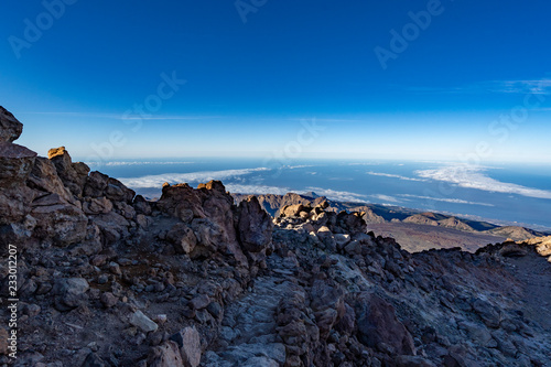 hikers reach the summit of Teide Mountain and enjoy the views from 3718 above sea level  Teide National Park  Tenerife  Canary Islands  Spain
