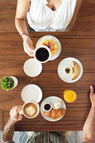 two people having breakfast photo