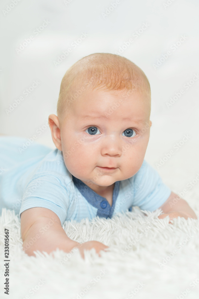 Portrait of beautiful baby boy on bed Portrait of beautiful baby boy on bed