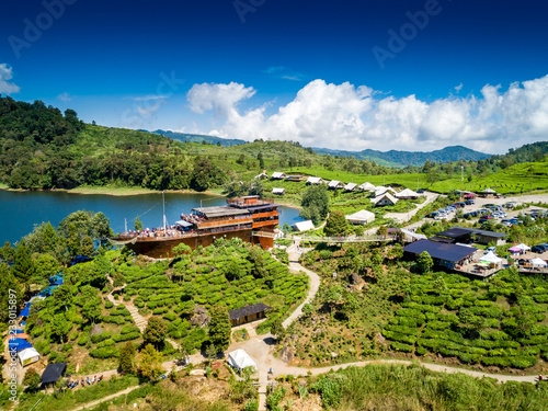 Aerial View of a Pinisi Boat Shaped Restaurant Building in the Edge of a Cape of Lake Patenggang, Ciwidey, Bandung, West Java, Indonesia, Asia photo