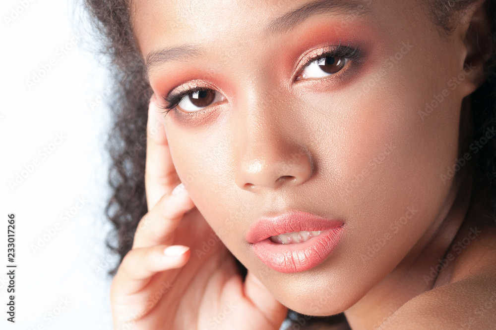 Young beautiful black girl with clean perfect skin close-up Young beautiful black girl with clean perfect skin close-up