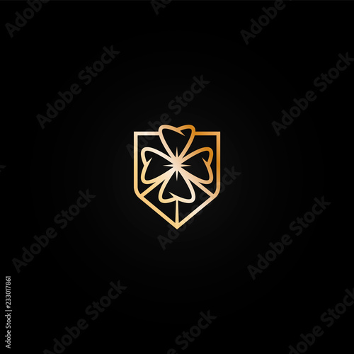 Bright shiny golden casino logo icon with  four leaf clover. Metal color logotype, label, emblem for gambling establishment, lottery, lucky place brand