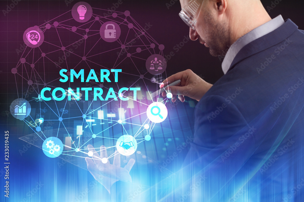 The concept of business, technology, the Internet and the network. A young entrepreneur working on a virtual screen of the future and sees the inscription: smart contract The concept of business, technology, the Internet and the network. A young entrepreneur working on a virtual screen of the future and sees the inscription: smart contract