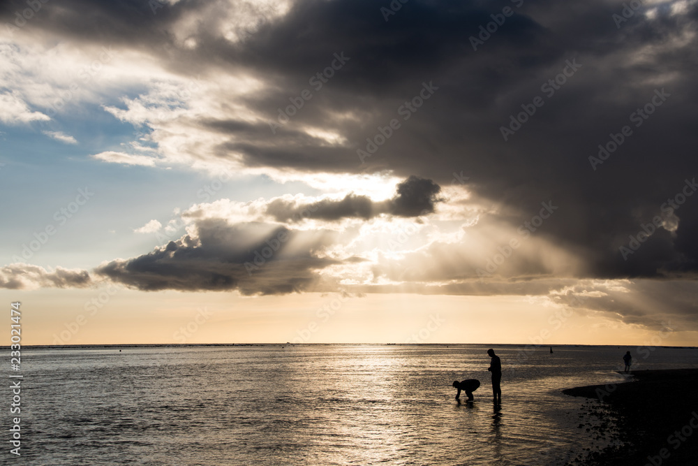 Silhouette on the beach with sunset background - Mauritius Silhouette on the beach with sunset background - Mauritius
