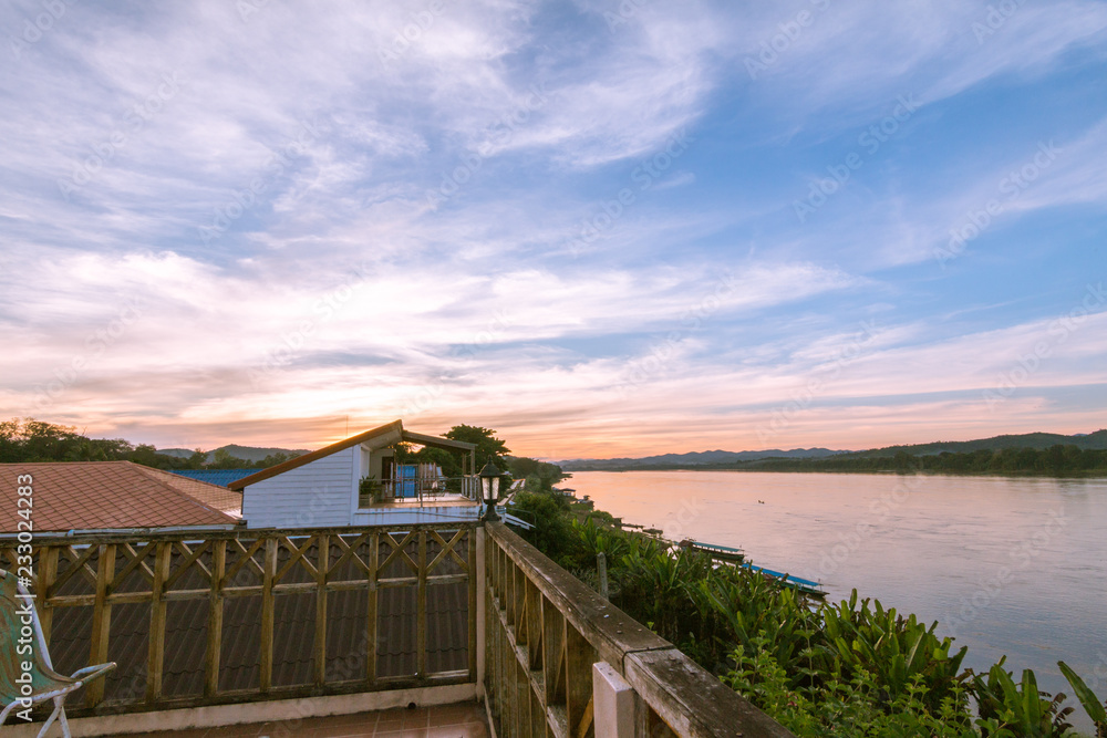 Clouds over river in sunrise time, Mae Khong river in Thailand