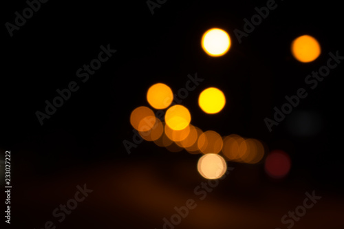 Defocused city night filtered bokeh abstract background