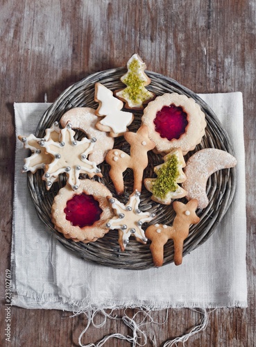 Assorted Christmas cookies on a wicker plate photo