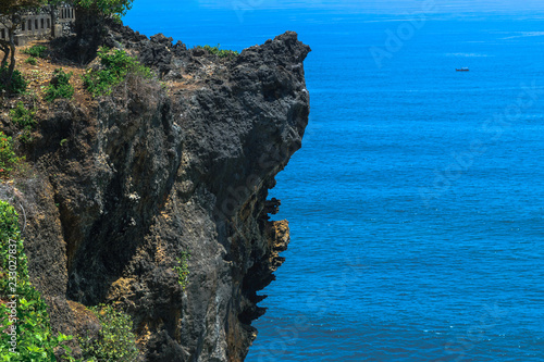 Landscape of cliff and blue Indian ocean in Bali island, Indonesia