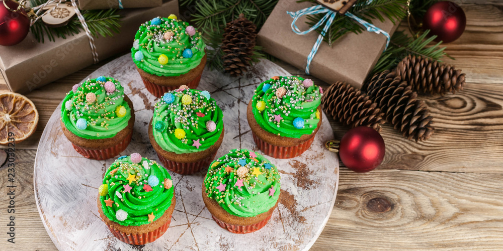 Food banner. Christmas Muffins with Green Cream