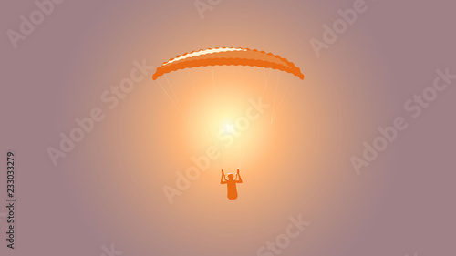 Paragliding. Paraglider flying in the sunset sky