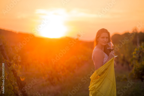 Young woman in vineyard