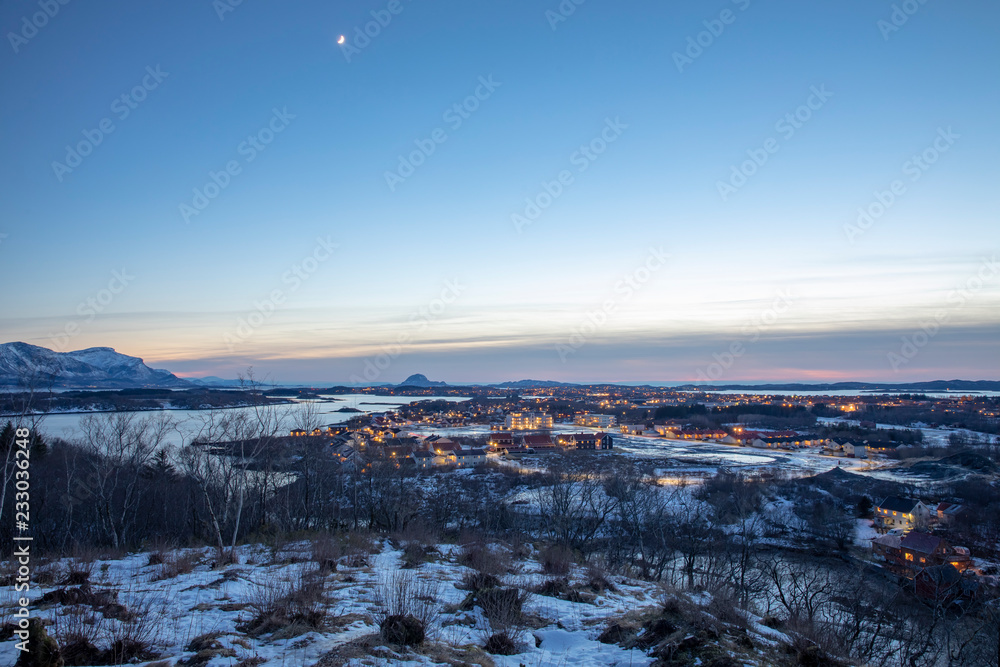 View from a hill outside the city towards the town and the mountain Torghatten; County of Nordland