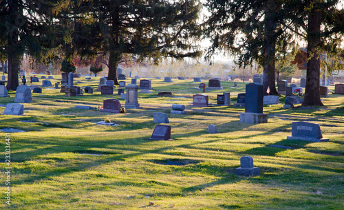 Wallpaper Mural cemetery at sunset, cemetery, gravestones, markers, death, died, grass,shadows, granite, stone, plots  Torontodigital.ca