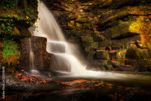 An almost unknown man made industrial waterfalls near Neath Abbey on the river Clydach  Skewen  South Wales  UK