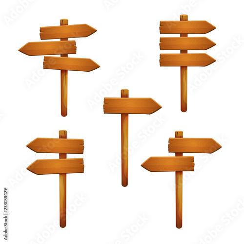 Set of wooden signposts with arrow shaped planks pointing in different directions isolated on a white background.