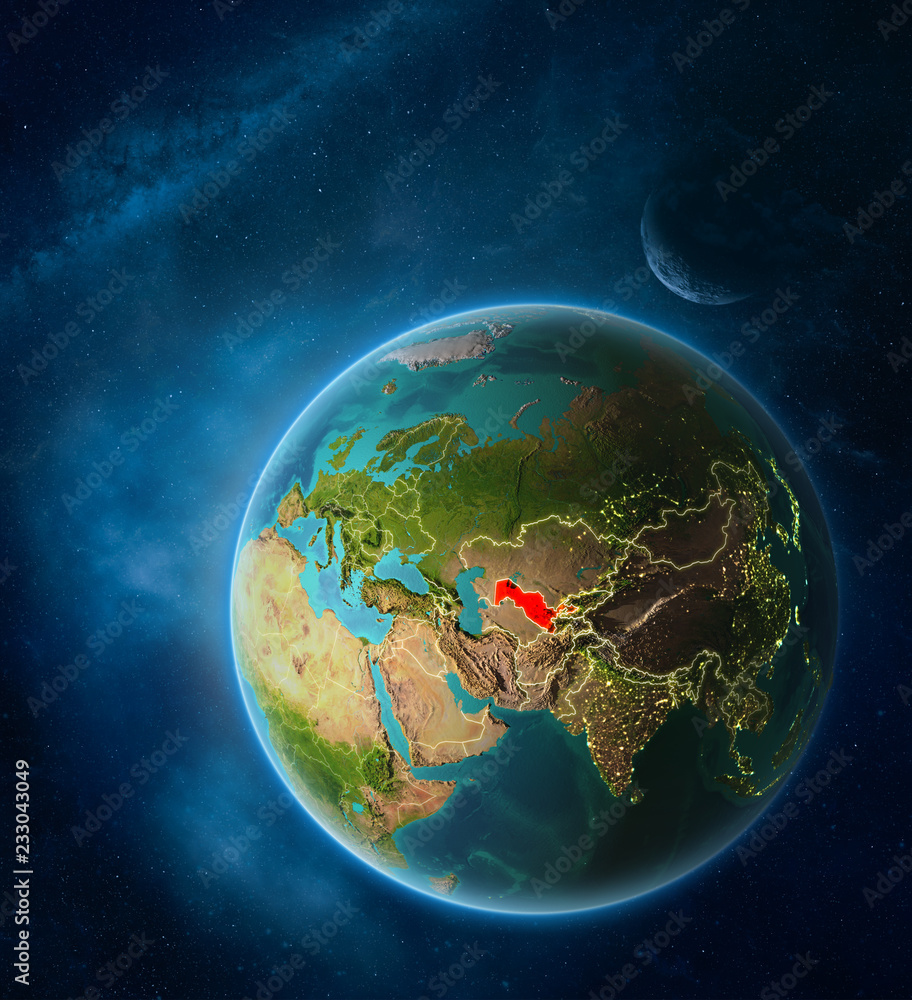 Planet Earth with highlighted Uzbekistan in space with Moon and Milky Way. Visible city lights and country borders.