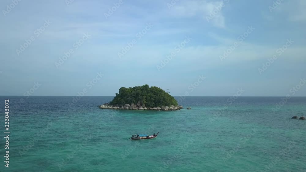 Aerial view of the Usen island, beautiful clear emerald sea, aerial drone view on tropical island, Ko Lipe, Thailand. Aerial view of the Usen island, beautiful clear emerald sea, aerial drone view on tropical island, Ko Lipe, Thailand.