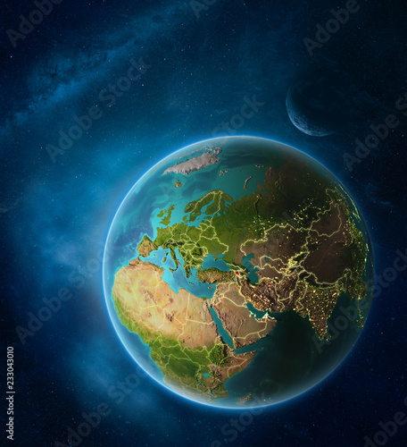 Fototapeta Naklejka Na Ścianę i Meble -  Planet Earth with highlighted Armenia in space with Moon and Milky Way. Visible city lights and country borders.