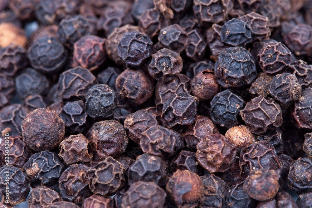 Whole Black Peppercorns macro close up Whole Black Peppercorns macro close up