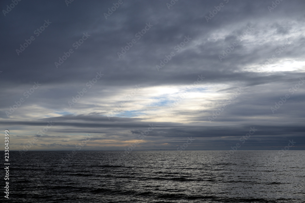 Fototapeta premium Dark cloud over sea.