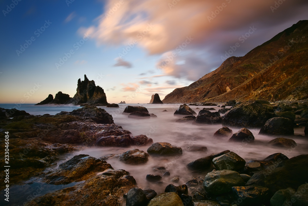 view of wild Benijo beach with big waves and black sand on the north coast of the Tenerife island, Spain view of wild Benijo beach with big waves and black sand on the north coast of the Tenerife island, Spain