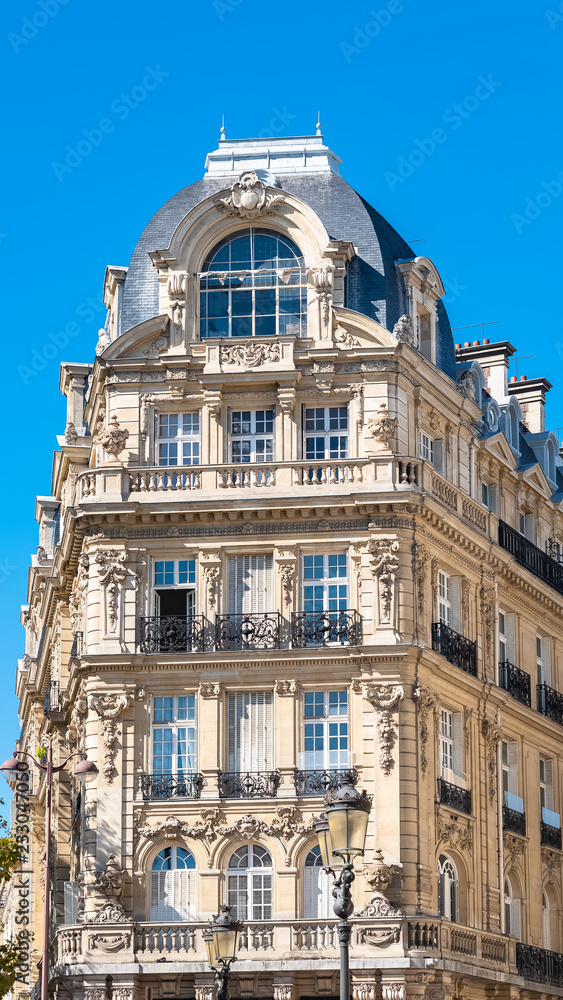     Paris, beautiful building boulevard des Batignolles, typical parisian facade 