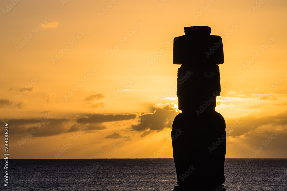 Moia silhouette in Easter Island during the sunset Moia silhouette in Easter Island during the sunset