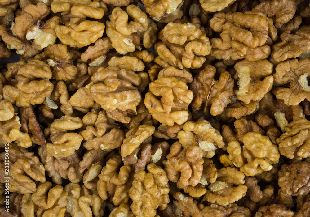 Walnuts background. Kernels walnuts. Top view. Vegetarian or healthy eating. Walnuts background. Kernels walnuts. Top view. Vegetarian or healthy eating.