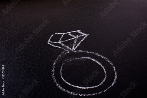 Diamond ring drawn on a blackboard