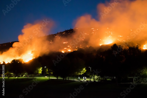 Hill on Fire Just Behind Suburban Park at Night during California Woolsey Brushfire