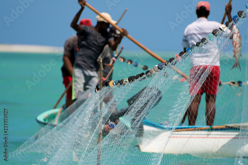 Net fishing in Rodrigues tropical island photo