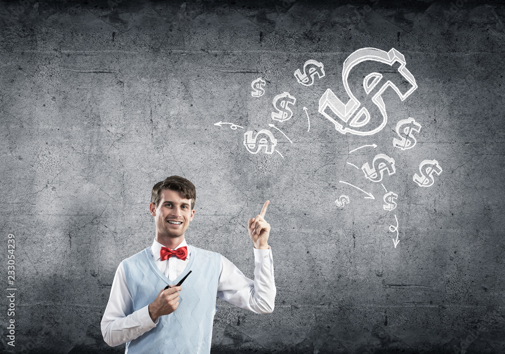 Elegant handsome businessman against concrete wall with pipe in 