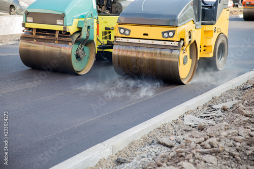 Works road roller with asphalt