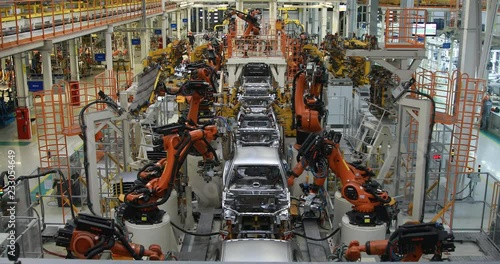 body of car on conveyor top view. Modern Assembly of cars at the plant. The automated build process of the car body