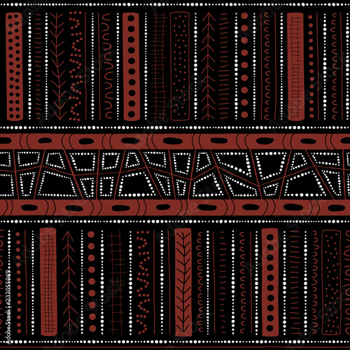 Vector seamless aboriginal pattern including ethnic Australian motive with typical elements on black background