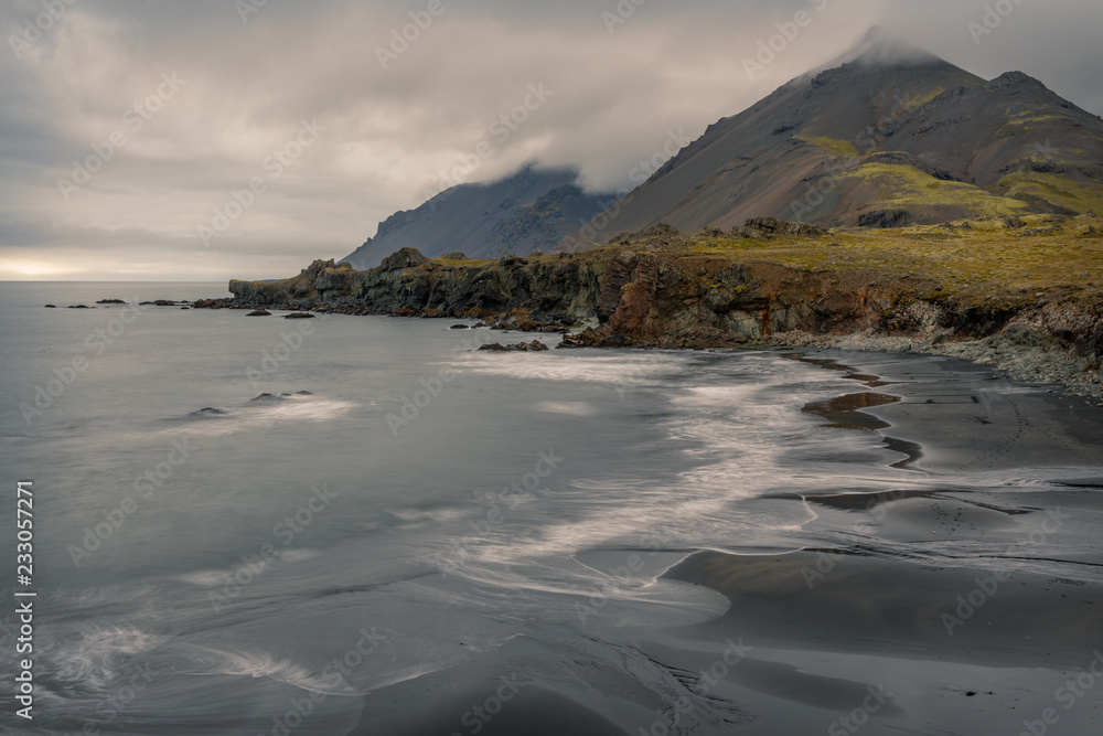 Icelandic coast and beach and a dramatic sky