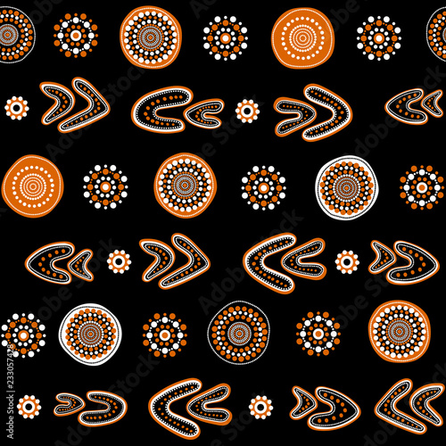 Australian aboriginal seamless vector pattern with dotted circles, rings and boomerangs