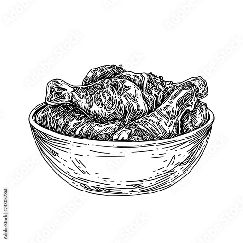 Plate with fried chicken legs. Sketch. Engraving style. Vector illustration.