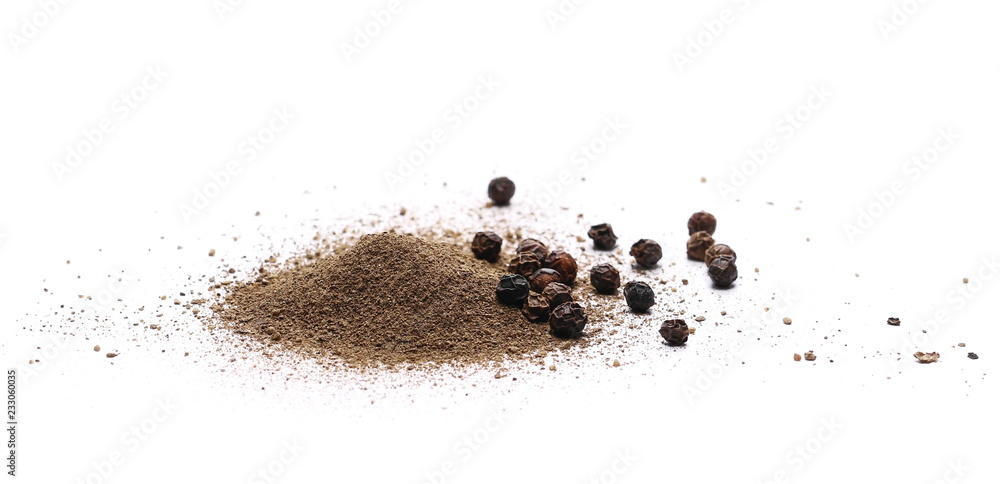 Black ground pepper and grain isolated on white background
