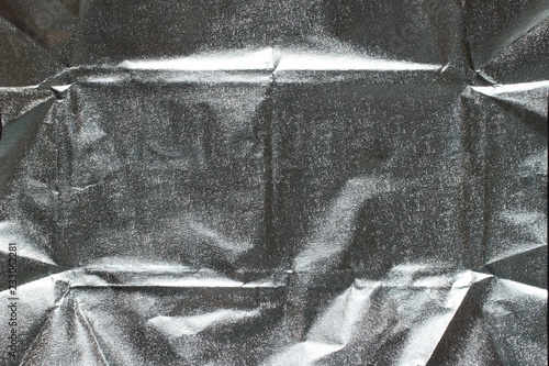 Foto A silver wrapper of chocolate close-up