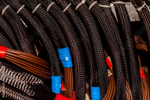 Cable assembly with the protective knit mesh cable cover shield for computer power.